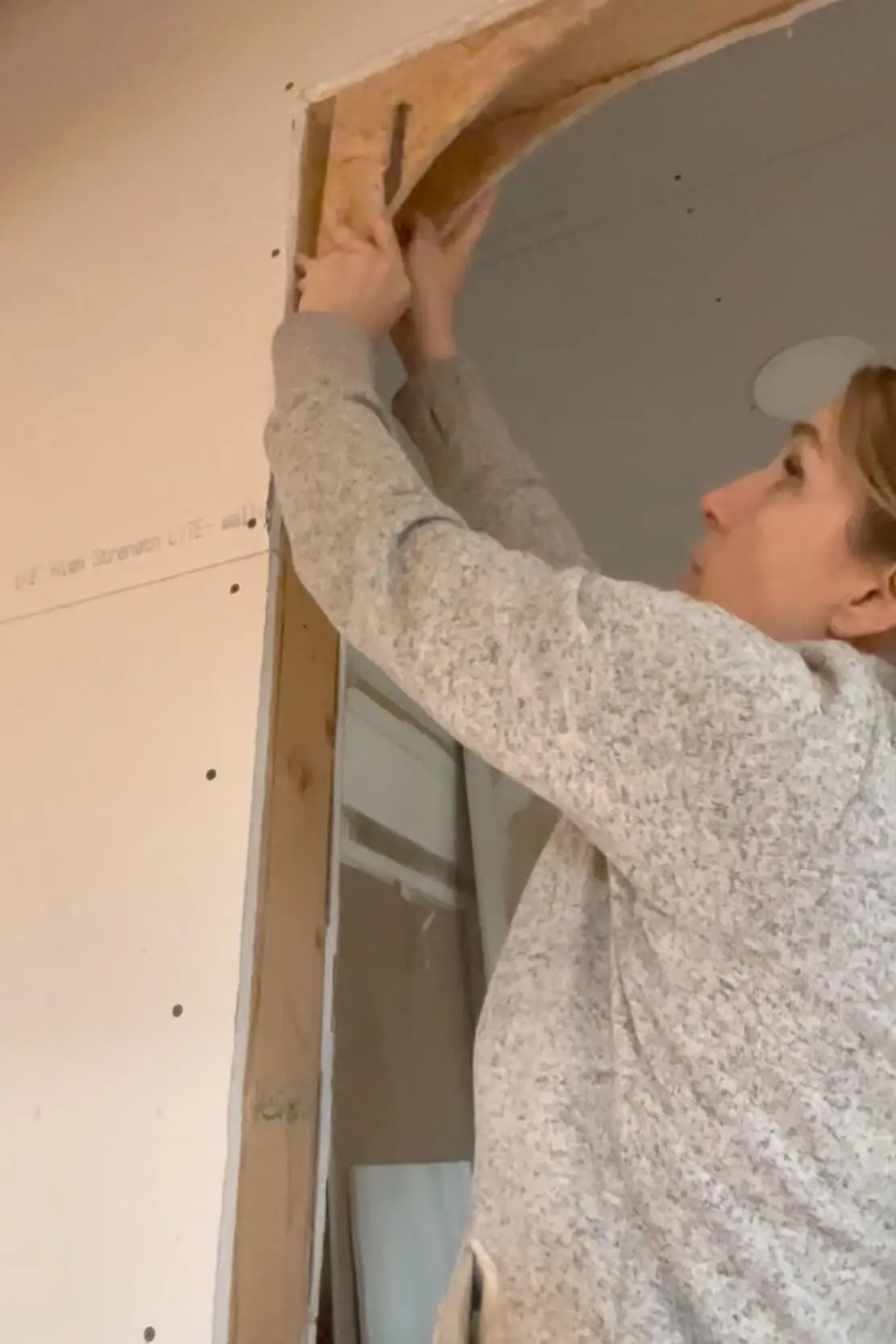 Wood faces of an arch for an arched doorway.